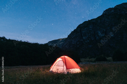 Tent underneath a starry sky photo