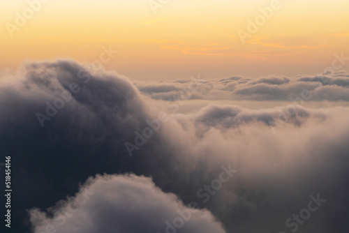 Amazing sunset on sea of clouds photo