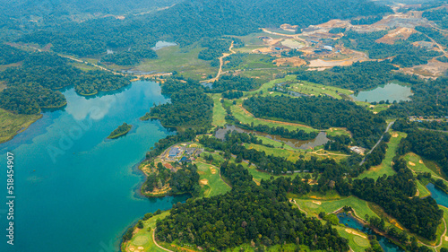 Aerial drone view of lake scenery with turquoise water in Tasik Puteri  Bukit Besi  Terengganu  Malaysia.
