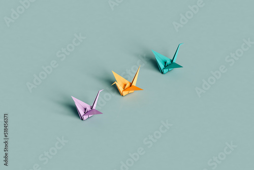 three colorful swan origami