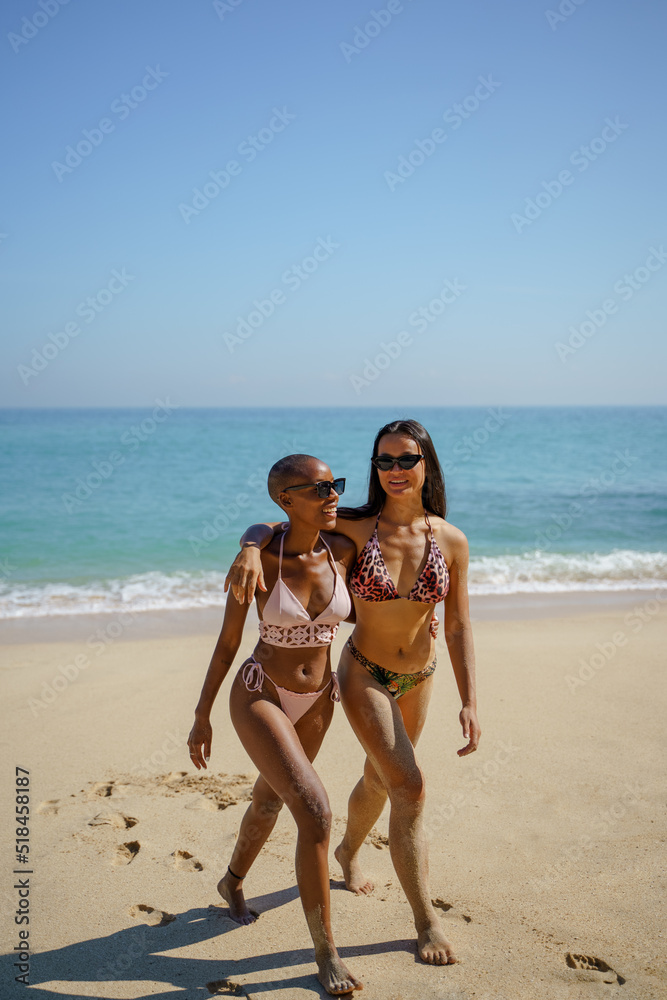 Two best friends spending time at beach together Two best friends spending time at beach together