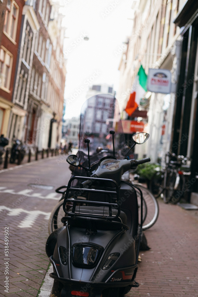 scooter parked on the street scooter parked on the street