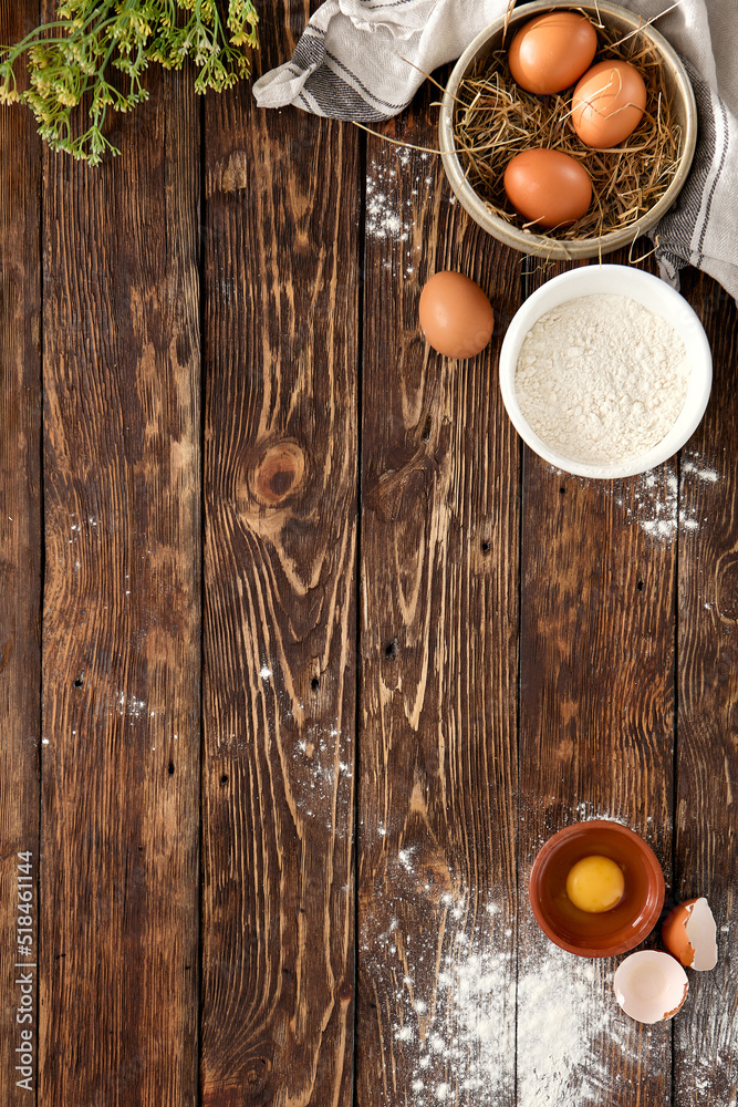 Aesthetic composition with pastry, eggs and flour on wooden background. Homemade pastry in rustic style. Wooden background with ingredients and copy space. Vintage composition with pastry. Aesthetic composition with pastry, eggs and flour on wooden background. Homemade pastry in rustic style. Wooden background with ingredients and copy space. Vintage composition with pastry.