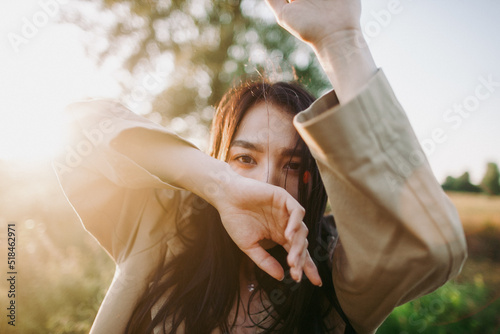 portrait of a young asian woman with the tree  photo