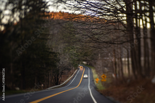 driving downhill on a road
 photo