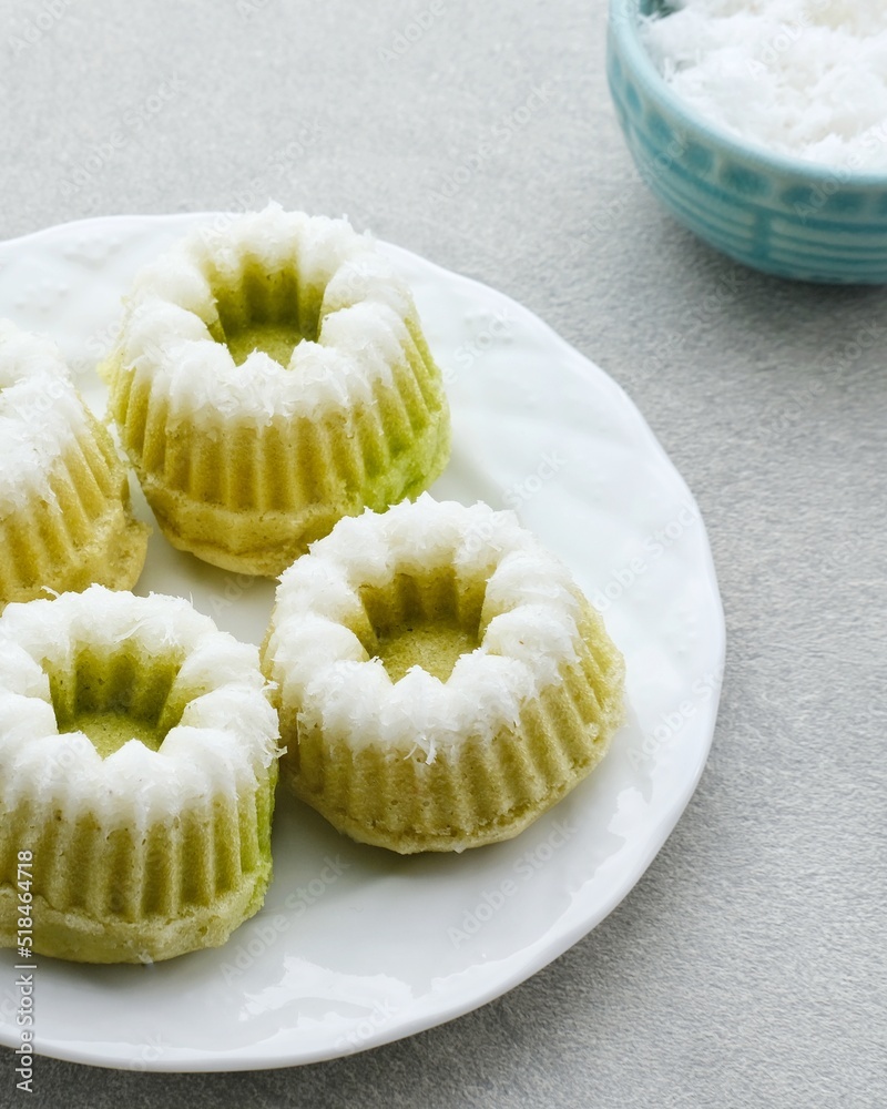 Kue Putu Ayu, a traditional Indonesian snack made from rice flour, suji leaves, pandan leaves, grated coconut then steamed, sweet and savory.
Kue Putu Ayu, a traditional Indonesian snack made from rice flour, suji leaves, pandan leaves, grated coconut then steamed, sweet and savory.