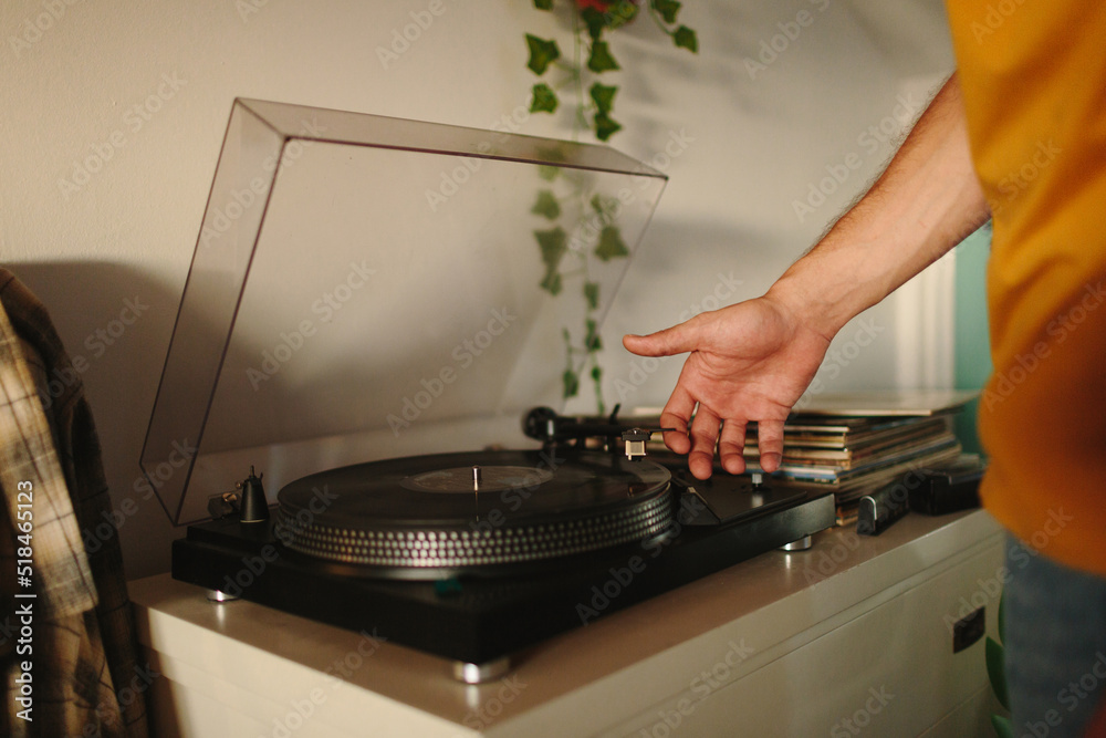 Man’s hands using a turntable Man’s hands using a turntable