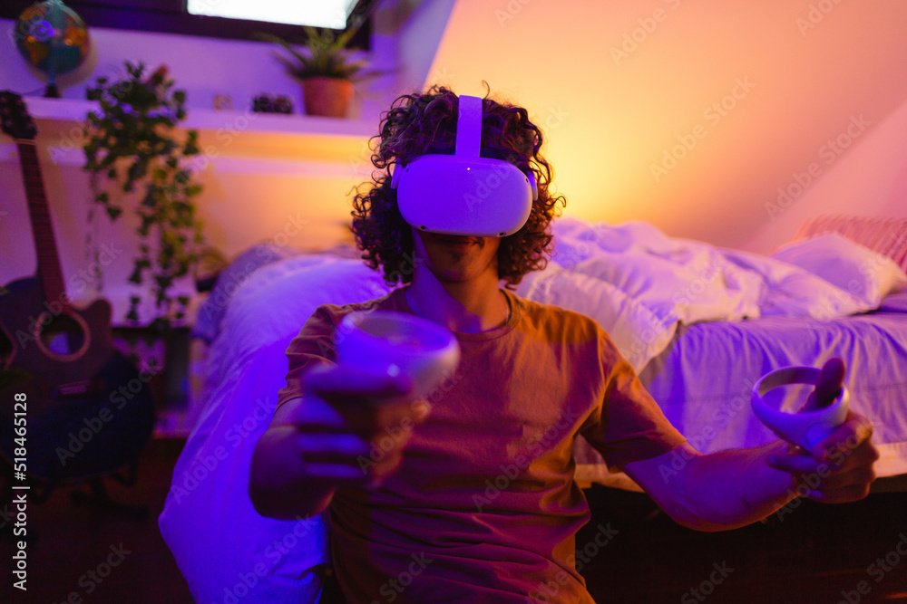 Close-up view of a man playing VR videogames Close-up view of a man playing VR videogames