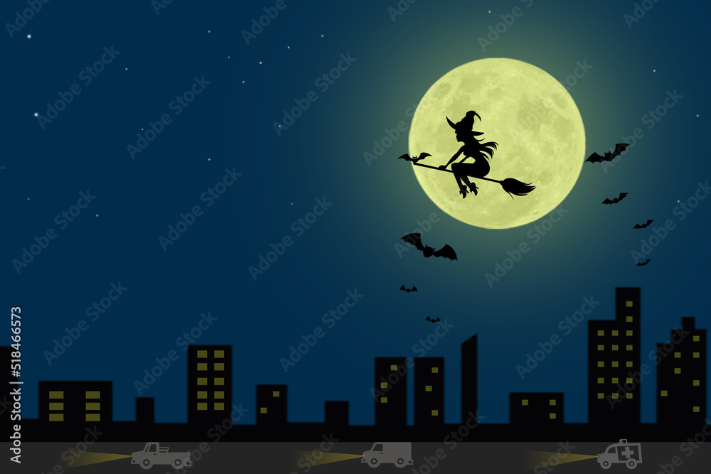 Witch on the moon and bats on Halloween.