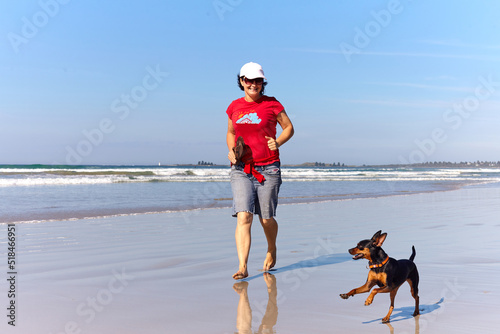 Happy times at the beach with a pet dog