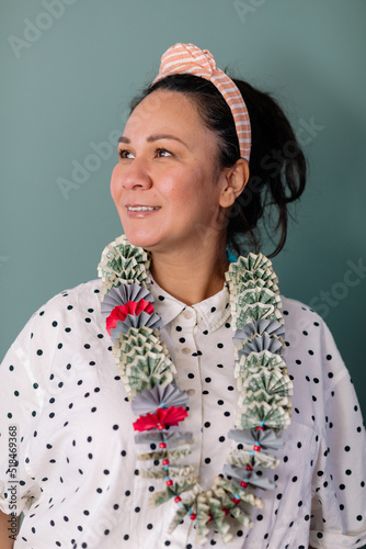 Woman wearing monei lei portrait photo