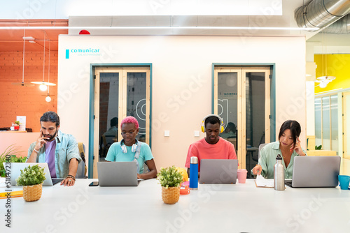 Young People Working In The Office photo