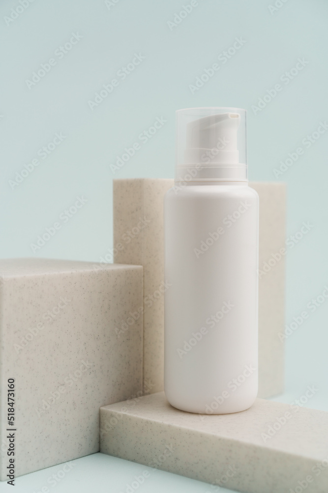 Refill Bottle Of A Beauty Product On The Blue Background Refill Bottle Of A Beauty Product On The Blue Background