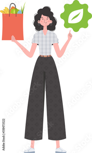 The woman is depicted in full growth and holds a bag of healthy food in her hands and shows the EKO icon. Isolated on white background. Flat trendy style. Vector.
