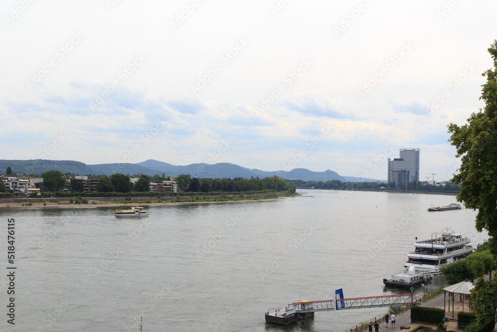 Panorama view of river Rhine (Rhein) with ships and mountains in Bonn, Germany