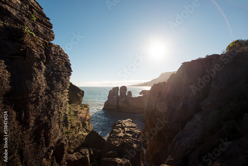 Big rocky cliffs during sunny day photo