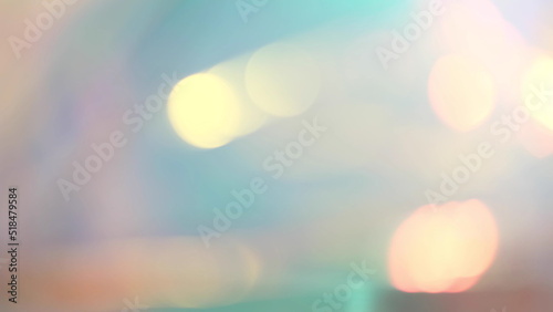 gentle light background. light passes through the facets of a diamond and creates repetitive sparkling highlights