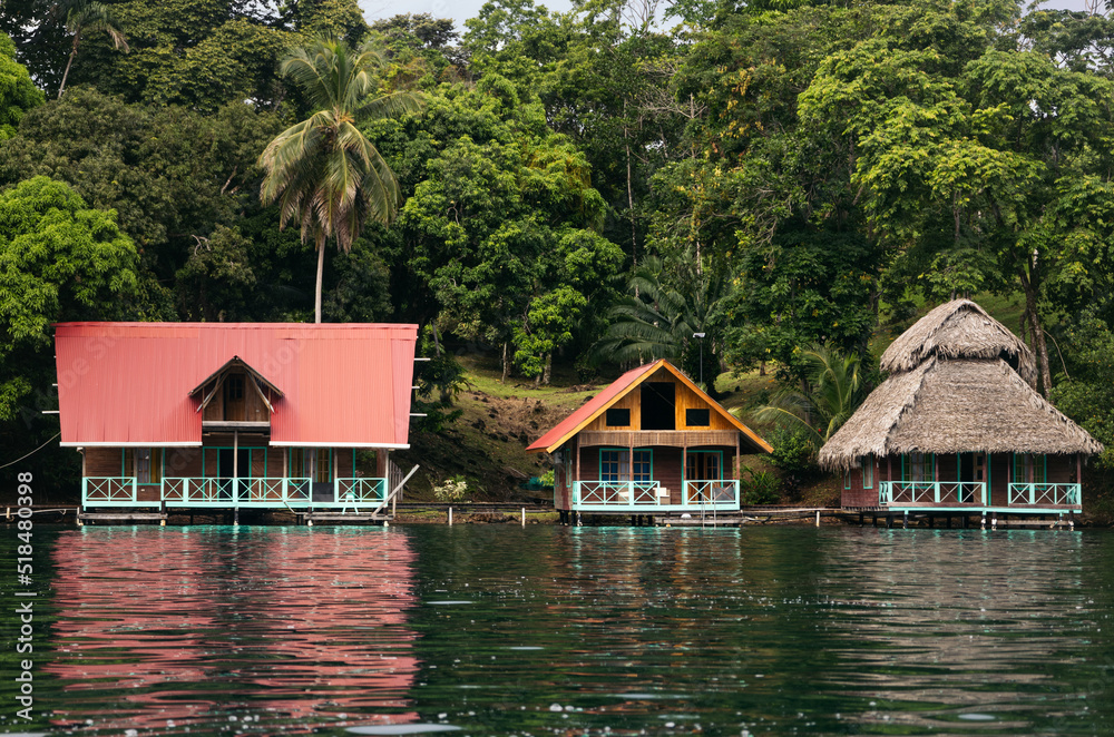 Little houses on a river in South America Little houses on a river in South America