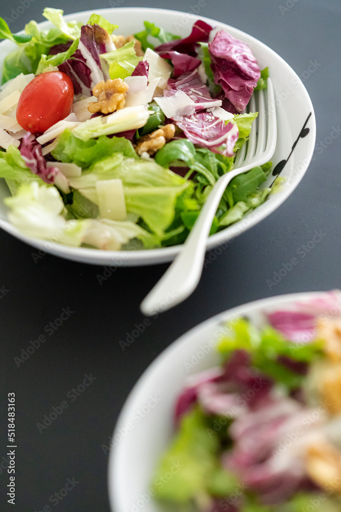 Healthy salads with assorted vegetables in bowls