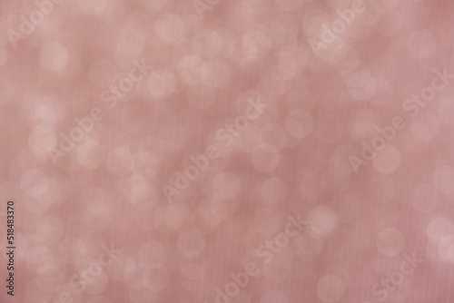 Pink bokeh circle abstract shining background. Blurred glittering wallpaper.