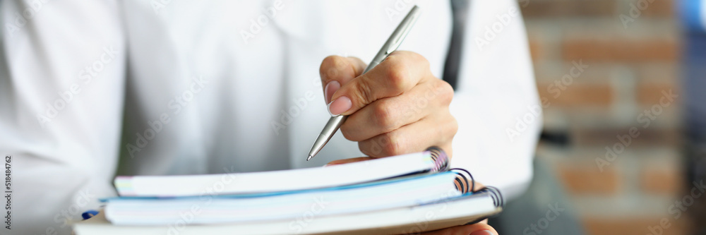Student hold stack of books, prepare for exam in university or extracurricular Student hold stack of books, prepare for exam in university or extracurricular