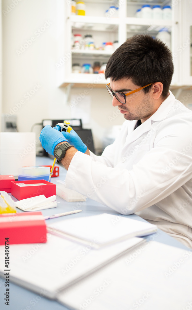 Scientist With Glasses Working In The Laboratory. Scientist With Glasses Working In The Laboratory.