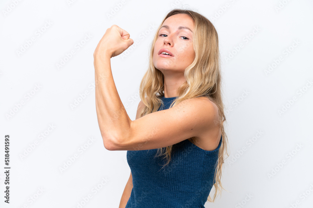 Young Russian woman isolated on white background doing strong gesture Young Russian woman isolated on white background doing strong gesture