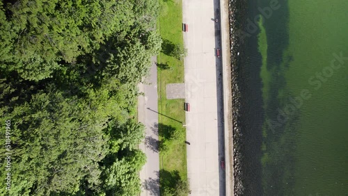 Wallpaper Mural Descending aerial top down shot of forest park, coastal path and Baltic Sea Water in Poland Torontodigital.ca