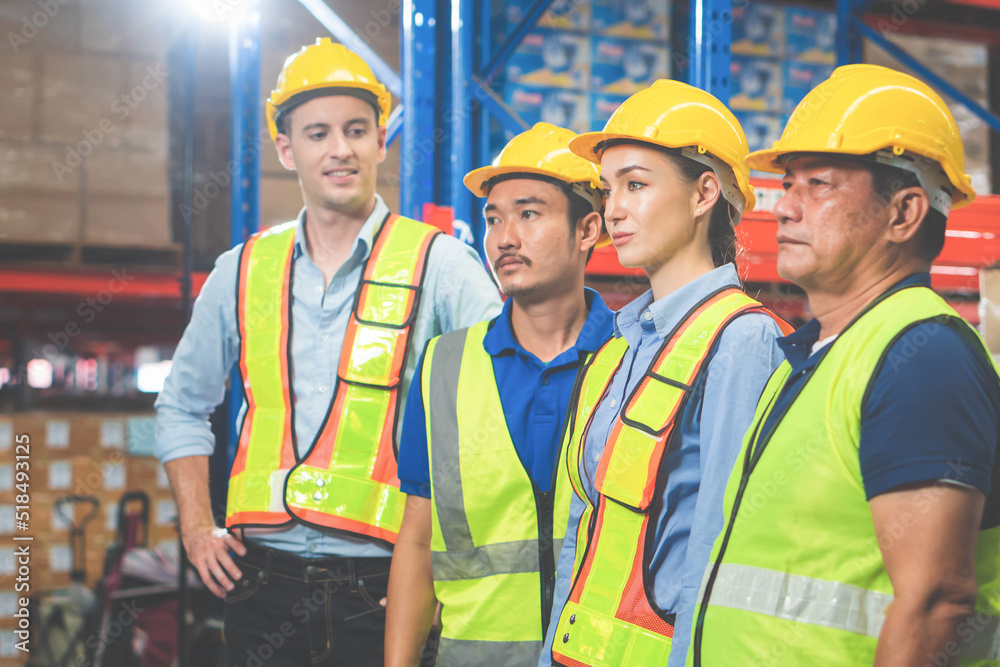 Portrait of successful logistics warehouse workers team, Group portrait of industry workers, Workers in hardhat helmet at workplace Portrait of successful logistics warehouse workers team, Group portrait of industry workers, Workers in hardhat helmet at workplace