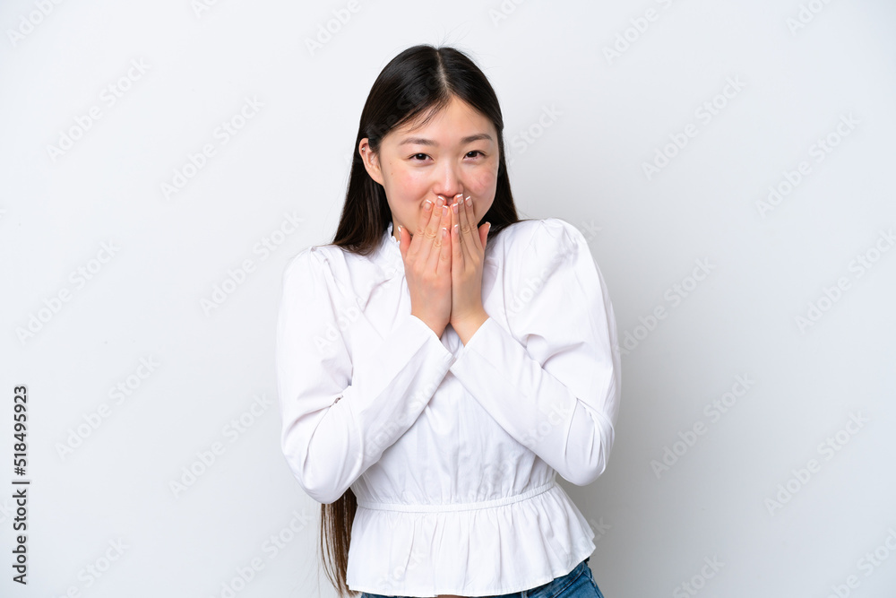 Young Chinese woman isolated on white background happy and smiling covering mouth with hands Young Chinese woman isolated on white background happy and smiling covering mouth with hands