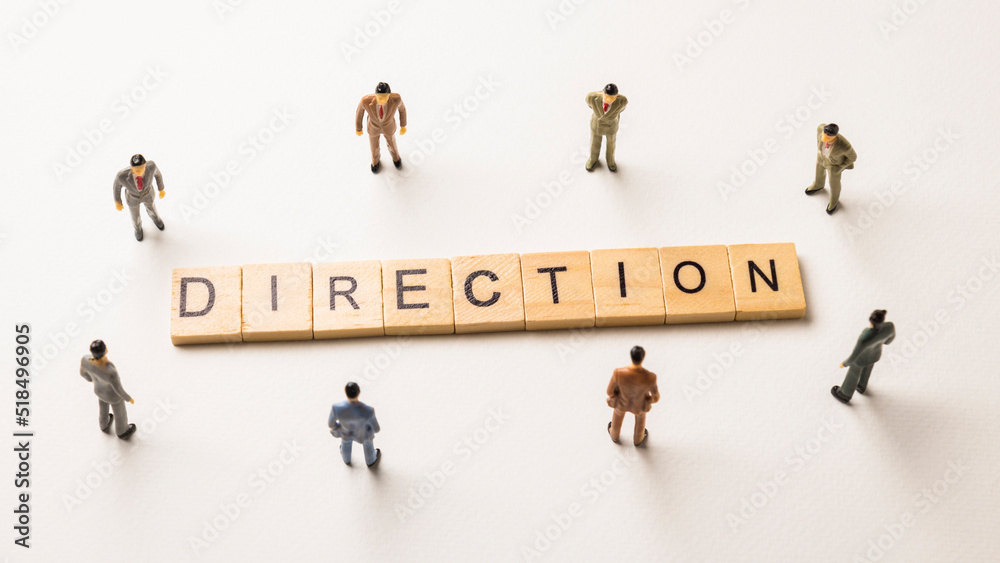 businessman figures at direction words