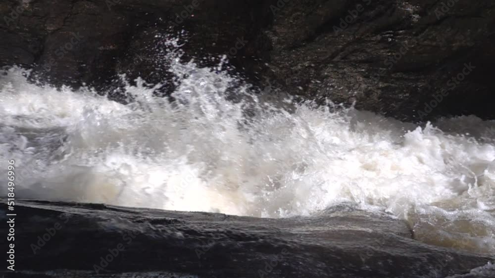 A strong stream of water in slowmotion A strong stream of water in slowmotion