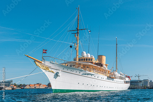 Royal Yacht Dannebrog, old ship of the Danish Queen in the harbour, serves as the official and private residence for the Queen and other members of the Royal Family © Michele Ursi