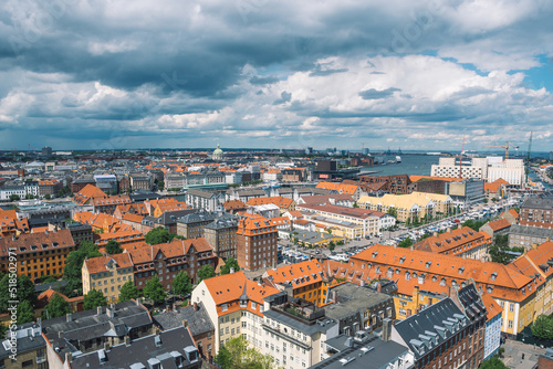 Panoramic or aerial view of Copenhagen, Denmark with buildings and harbour 