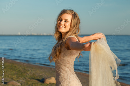 Happy woman enjoying sun on sea