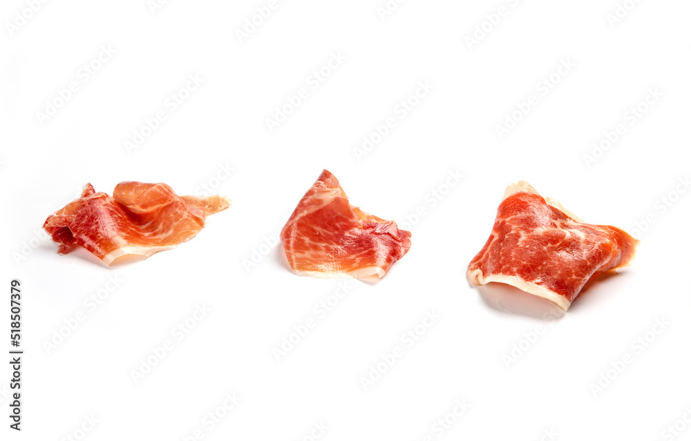 jamón ibérico en lonchas sobre fondo blanco jamón ibérico en lonchas sobre fondo blanco