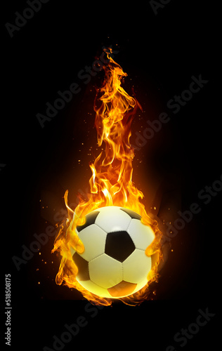 Soccer ball  fire in hand black background