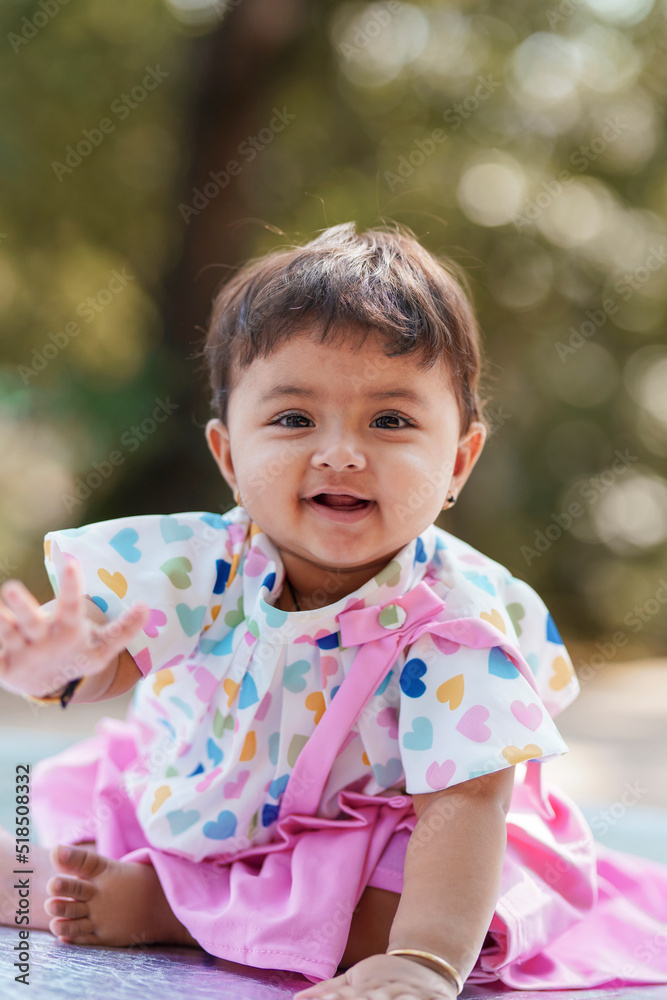 Indian baby girl smiling and giving expression. Indian baby girl smiling and giving expression.