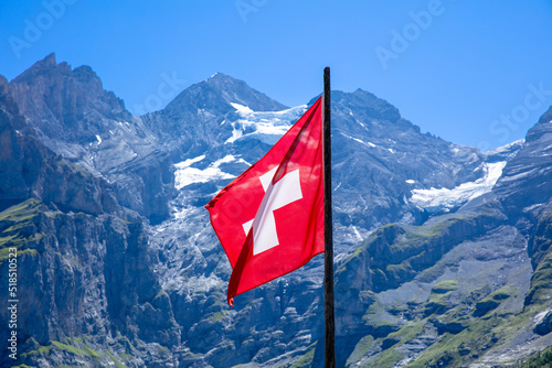 Swiss flag and alps mountain