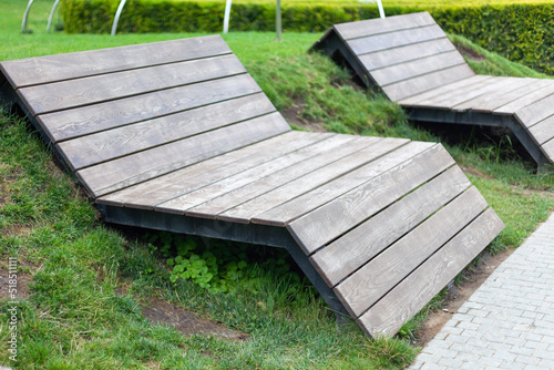 Benches for resting in a holiday park in summer