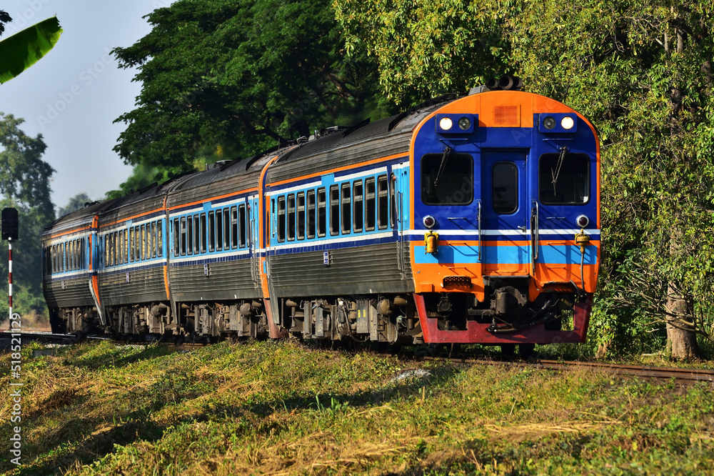 Diesel railcar on the railway in Thailand Diesel railcar on the railway in Thailand
