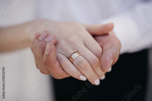 Hands of lovers with wedding rings