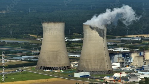 Aerial view to nuclear power plant in France. Atomic power stations are very important sources of electricity with low carbon footprint. Aerial view to big source of emissions in European Union