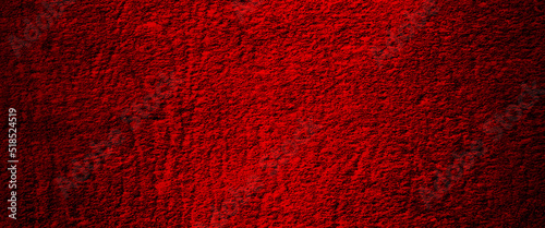 Red wall backdrop background with red faded border and old vintage grunge texture, dark slate background toned classic red color, old textured background.