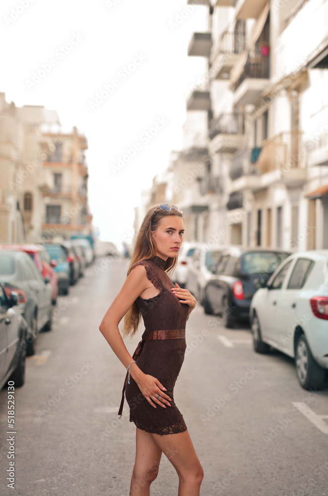 portait of a young beautiful woman in the street