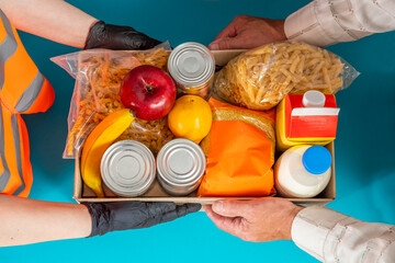 Help Collection Center, Free Food Distribution. Volunteering, food donation box grocery set for in-need people