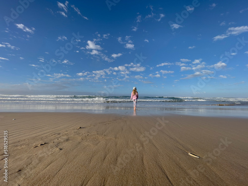 Girl looking out over ocean