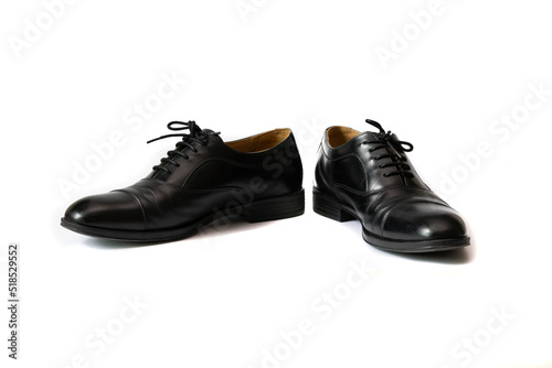 Classic male black leather shoes isolated on a white background