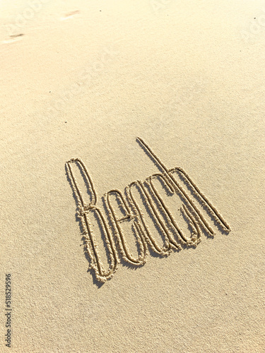 beach inscription on the sand