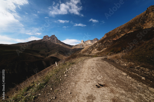 Autumn day on a scenic but difficult 4X4 track located in front of the summit. Off-road, wide angle © yanik88